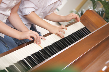 Image showing Children Playing the Piano