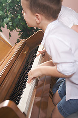 Image showing Children Playing the Piano