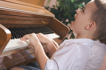 Image showing Children Playing the Piano