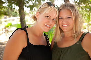 Image showing Two Beautiful Smiling Sisters Ourdoor Portrait
