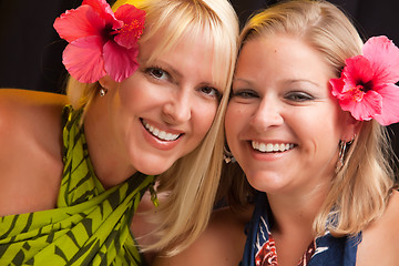 Image showing Beautiful Smiling Girls with Hibiscus Flower