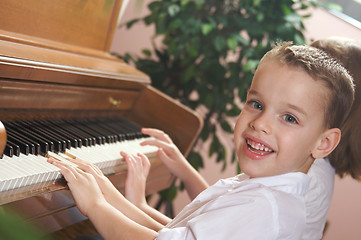 Image showing Children Playing the Piano