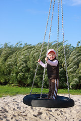Image showing  girl on a swing