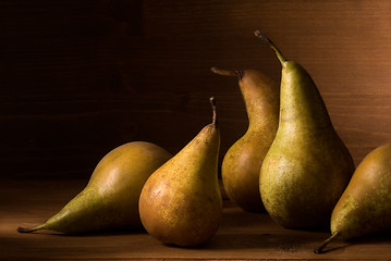 Image showing composition of pears on wooden table