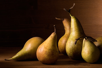 Image showing composition of pears on wooden table