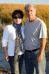 Image showing happy middle age senior couple on beach