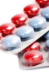 Image showing red and blue pills in plastic blister