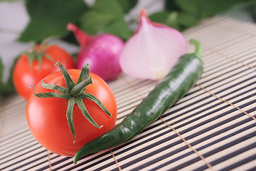 Image showing Tomatoes, onions and hot green pepper