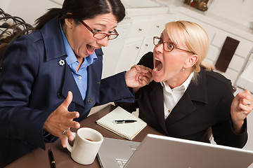 Image showing Businesswomen Celebrate Success on the Laptop