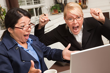 Image showing Businesswomen Celebrate Success on the Laptop