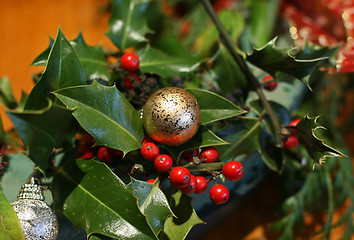 Image showing Christmas baubles and holly