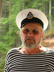 Image showing Old seaman with a white hat and stripy shirt