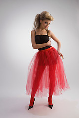 Image showing Beautiful girl in red skirt