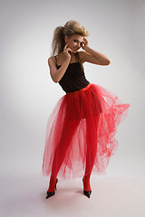 Image showing Beautiful girl in red skirt