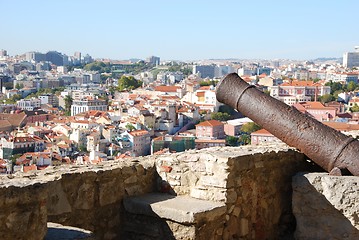 Image showing Cityscape of Lisbon in Portugal with cannon weapon