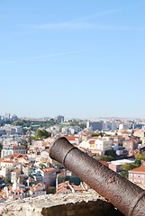 Image showing Cityscape of Lisbon in Portugal with cannon weapon