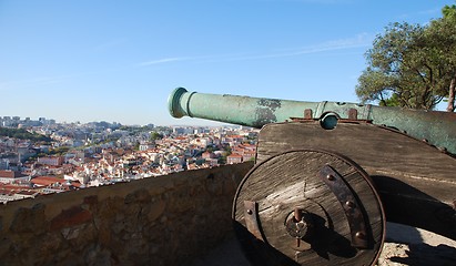 Image showing Cityscape of Lisbon in Portugal with cannon weapon