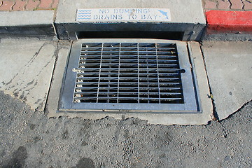 Image showing No Dumping Drains to Bay Sign