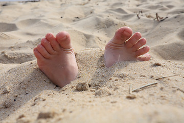 Image showing Fingers from sand