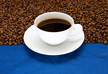 Image showing Cup of  coffee on a blue background