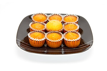 Image showing cakes on a plate , isolated over white