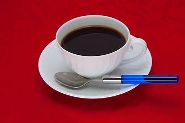 Image showing Coffee cup over red background