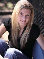 Image showing Sitting on a Blue Bench