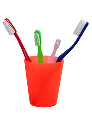 Image showing Toothbrushes and cup