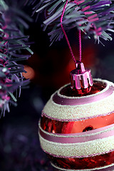 Image showing Christmas ornaments on tree.