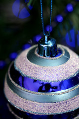 Image showing Christmas ornaments on tree.