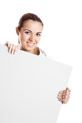 Image showing Woman holding a billboard