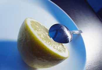 Image showing lemon and spoon