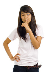 Image showing woman with finger on her lips
