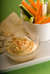 Image showing hummus dip with pita brad and vegetable