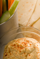 Image showing hummus dip with pita brad and vegetable