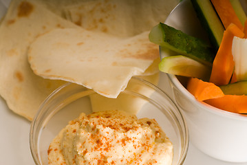 Image showing hummus dip with pita brad and vegetable