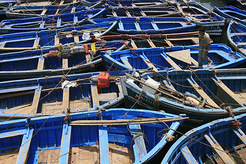 Image showing Blue fishing boats in Essaouira port, Morocco