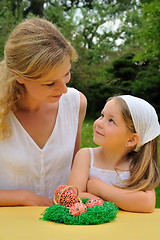 Image showing Young mother and daughter having Easter time