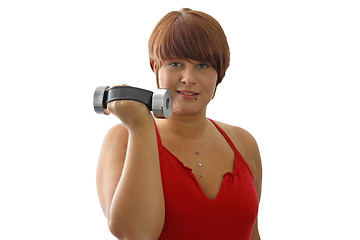 Image showing Young woman with dumbbell