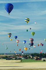 Image showing hot air ballloons flying over french village