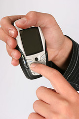 Image showing Dialing on a cellular phone