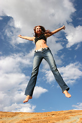 Image showing Woman jumping of joy