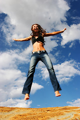 Image showing Woman jumping of joy