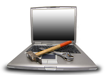 Image showing laptop and tools