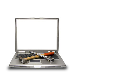 Image showing laptop and tools