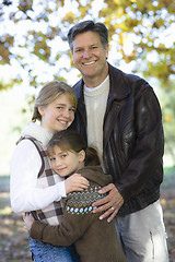 Image showing Father and Daughters