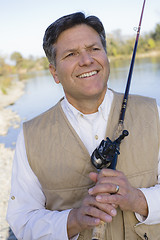 Image showing Man With Fishing Pole