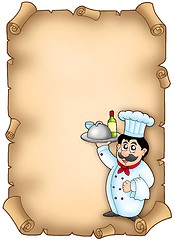 Image showing Chef holding meal on parchment