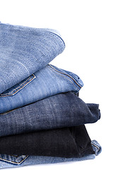 Image showing stack of blue jeans