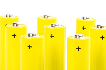 Image showing eight yellow alkaline batteries